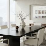 A minimalist, high-key photograph of a modern boardroom setting infused with subtle cultural artifacts. A sleek black oak table reflects soft, diffused daylight. In the center, a sculptural ceramic vase holds sparse, structural dry branches. The mood is authoritative yet serene, representing a new era of global executive leadership with a distinct aesthetic identity.